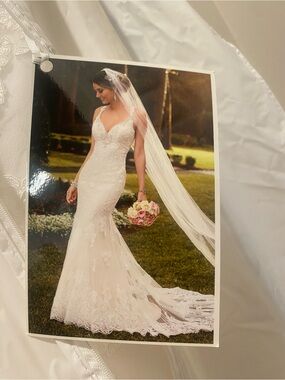 Stella York Ivory Lace Mermaid Wedding Dress